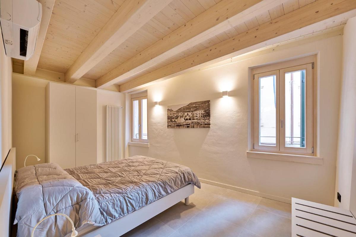 ApartmentsGarda - Residenza Mercanti - Housity