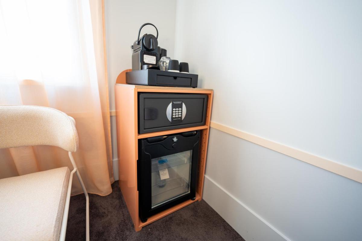 Cuisine ou kitchenette dans l'établissement Aiden by Best Western Clermont-Ferrand Hotel & Spa