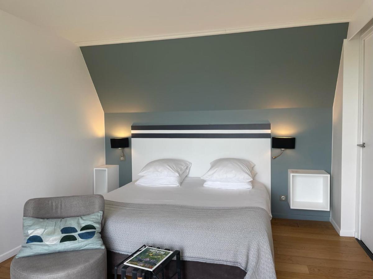 Un ou plusieurs lits dans un hébergement de l'établissement Hôtel - Spa Les Corderies