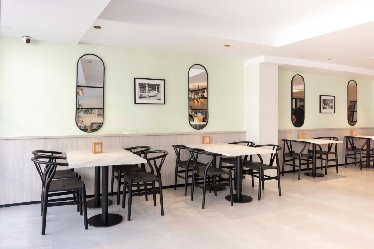 Un restaurante o sitio para comer en Alfons Hotel