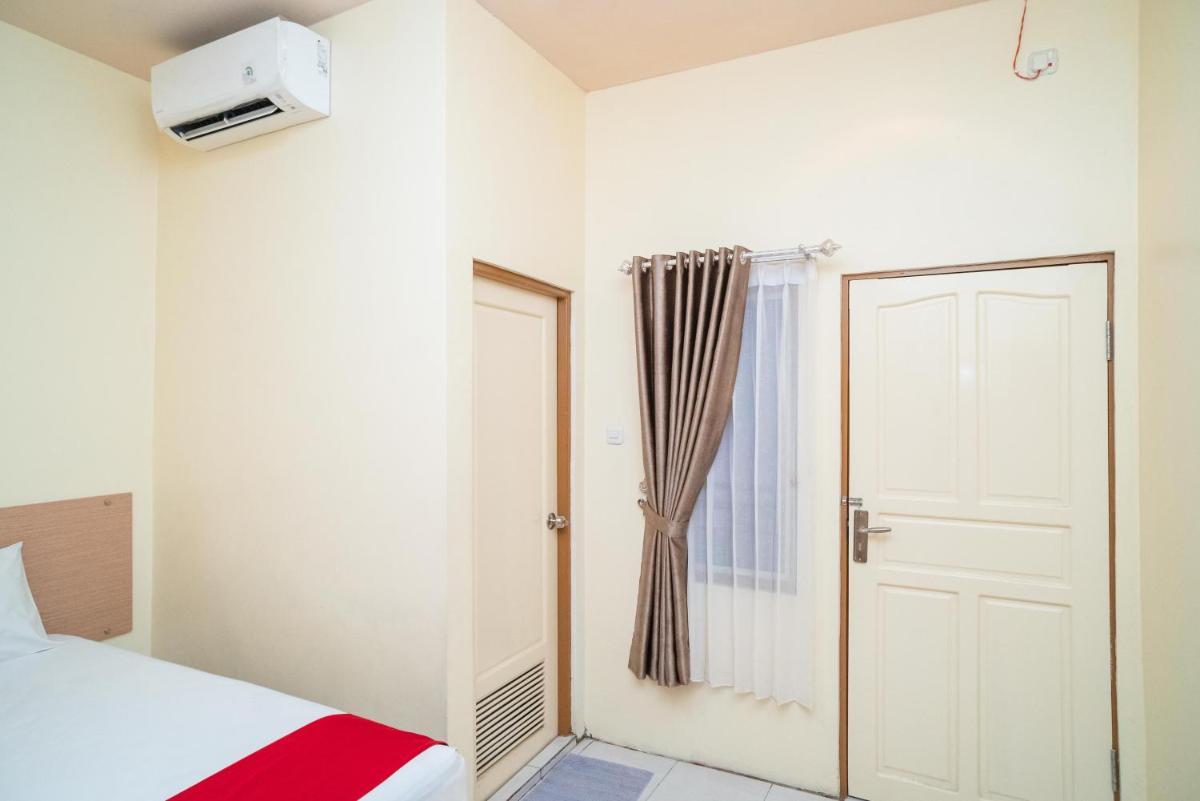 RedDoorz Syariah near Taman Siring 2 - Housity
