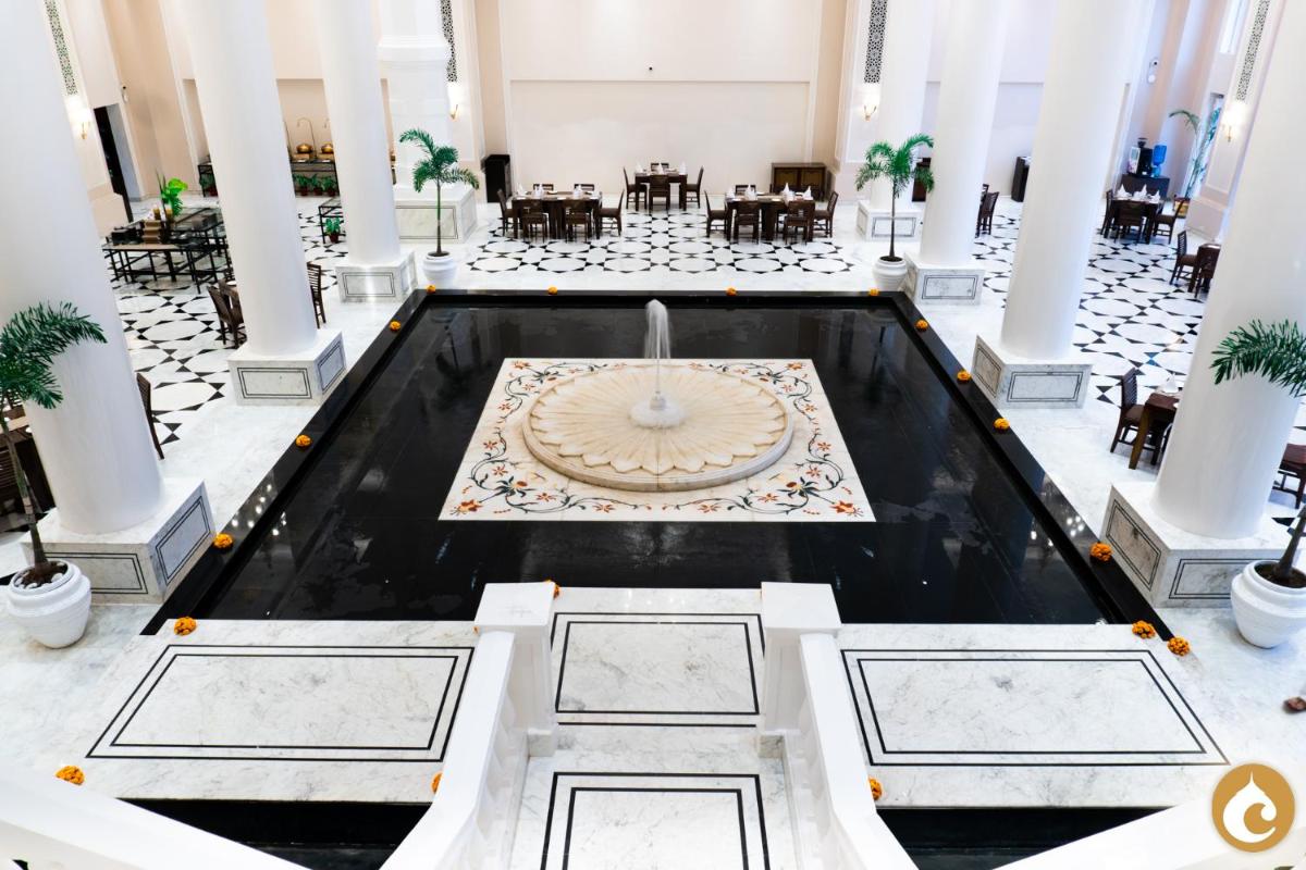 a view of the lobby of a hotel with a fountain at Clarks Avadh in Lucknow