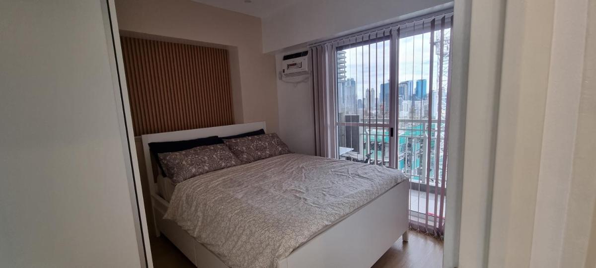Modern Muji themed 2-bedroom condo - Housity