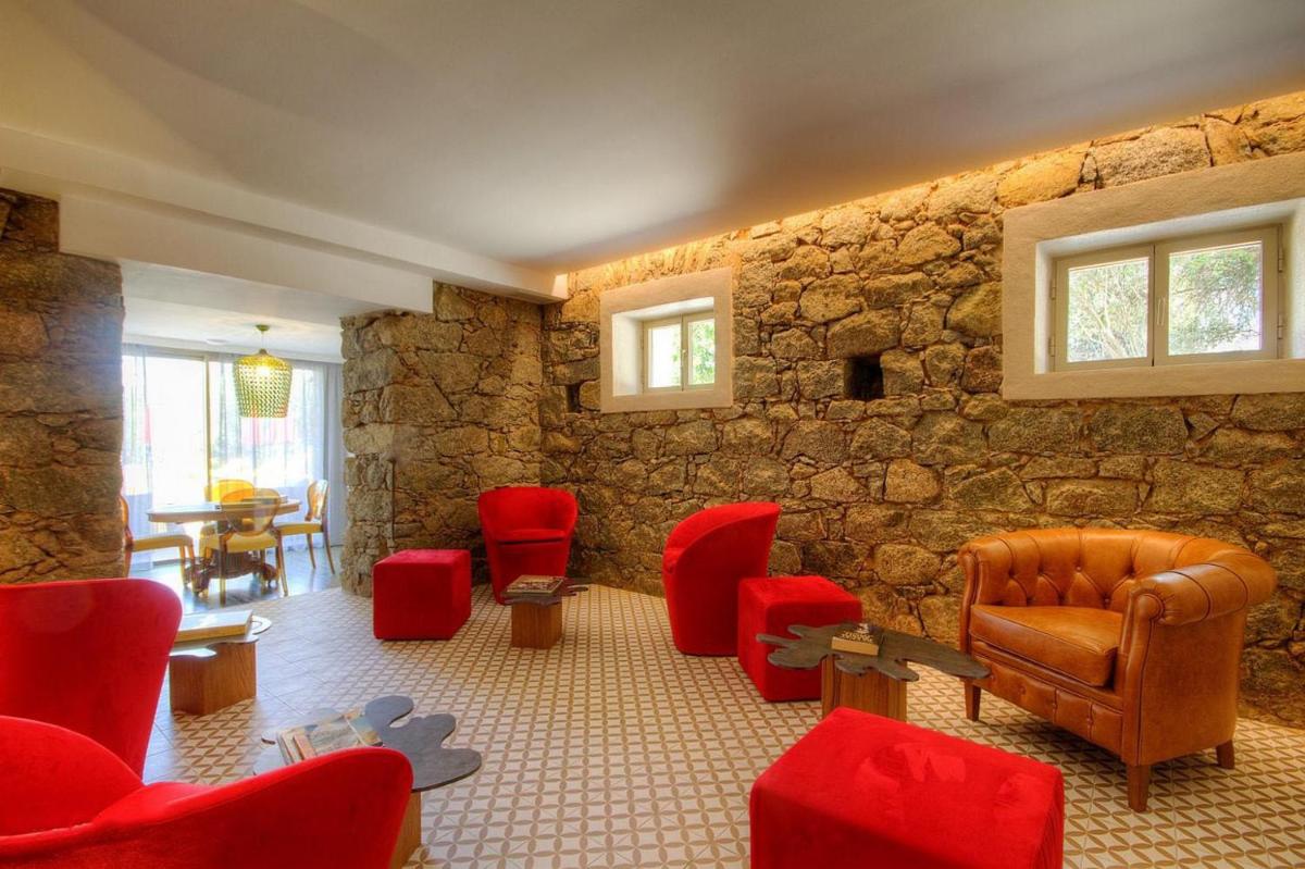 Coin salon dans l'établissement Hôtel Casale Olmia