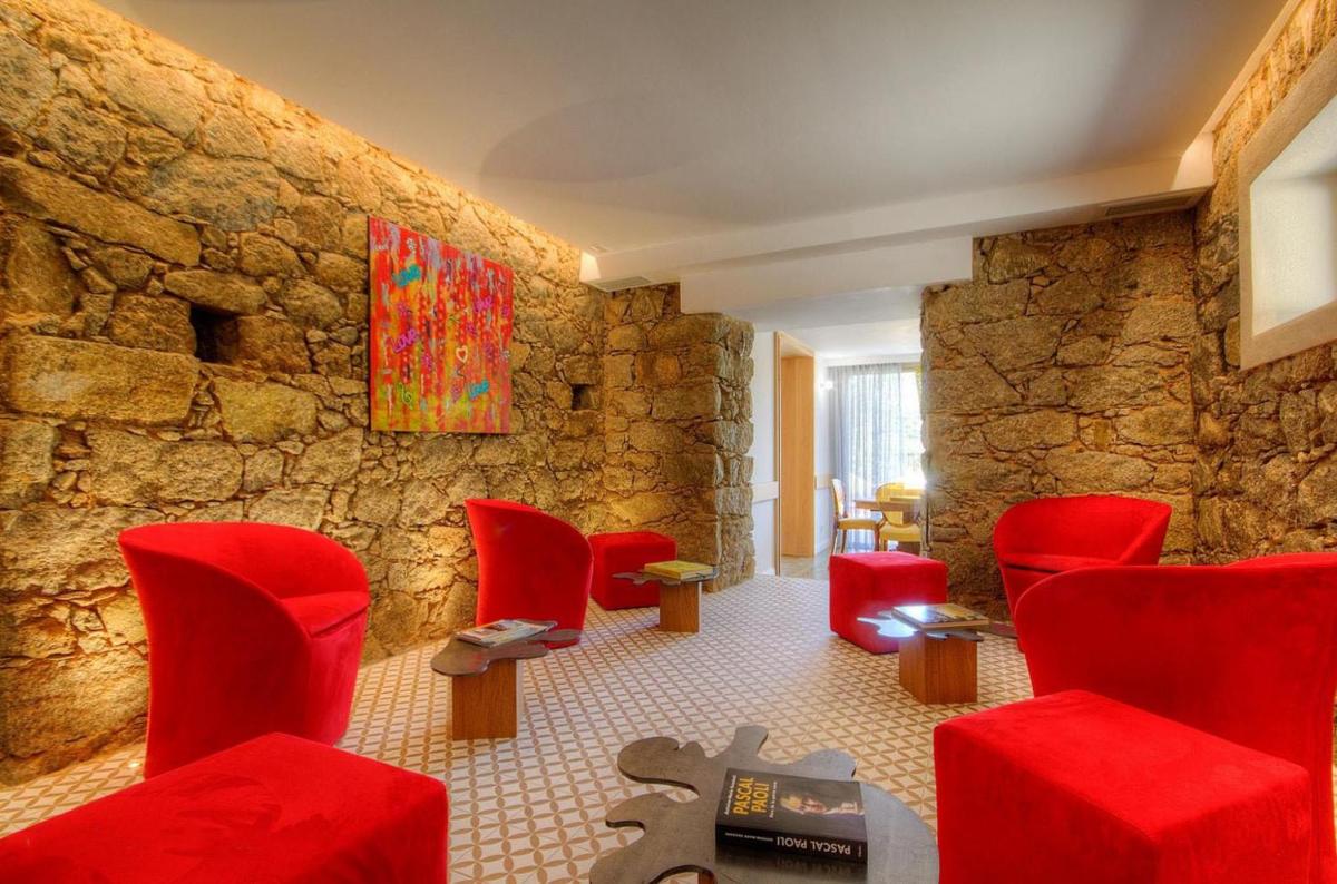 Coin salon dans l'établissement Hôtel Casale Olmia
