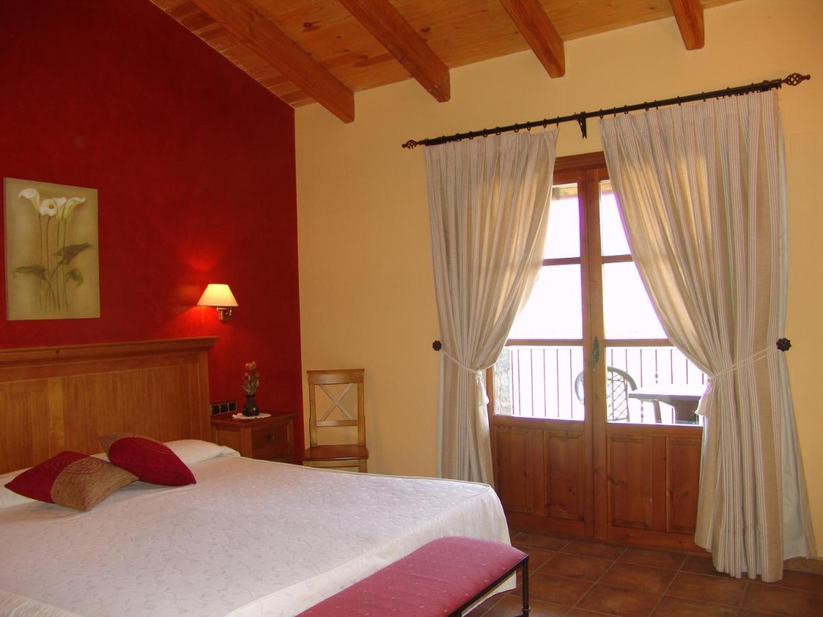 Cama o camas de una habitación en Hotel & SPA Peña Montañesa