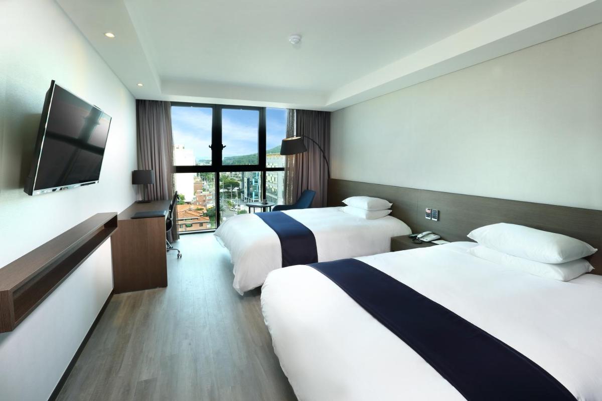 Hotel The One - Housity