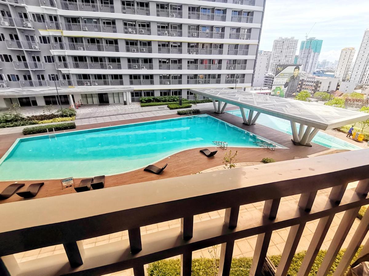 Stylish 1 Bedroom Condo Unit with Perfect Pool View Balcony at Fame Residences - Housity