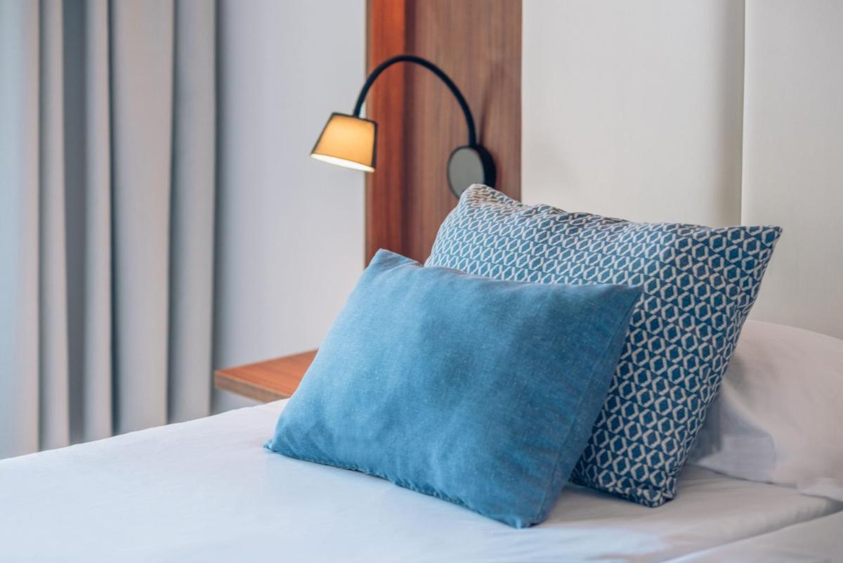 Cama o camas de una habitación en Iberostar Selection Playa de Muro Village