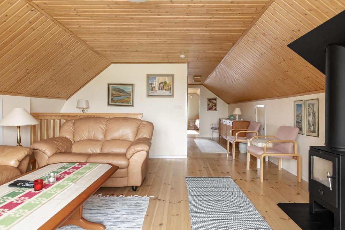 Lovely holiday home in the village of Flattinge, with a view of lake Flaren - Housity