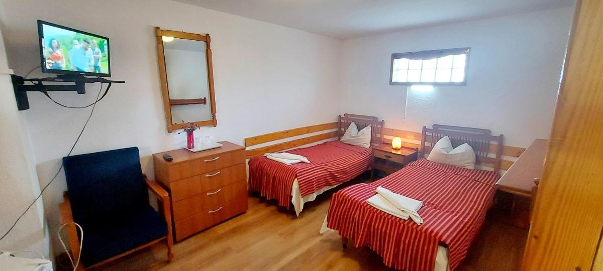 Apartamente Casa Cristina in Pensiune la 400m de Pârtia de ski - Housity