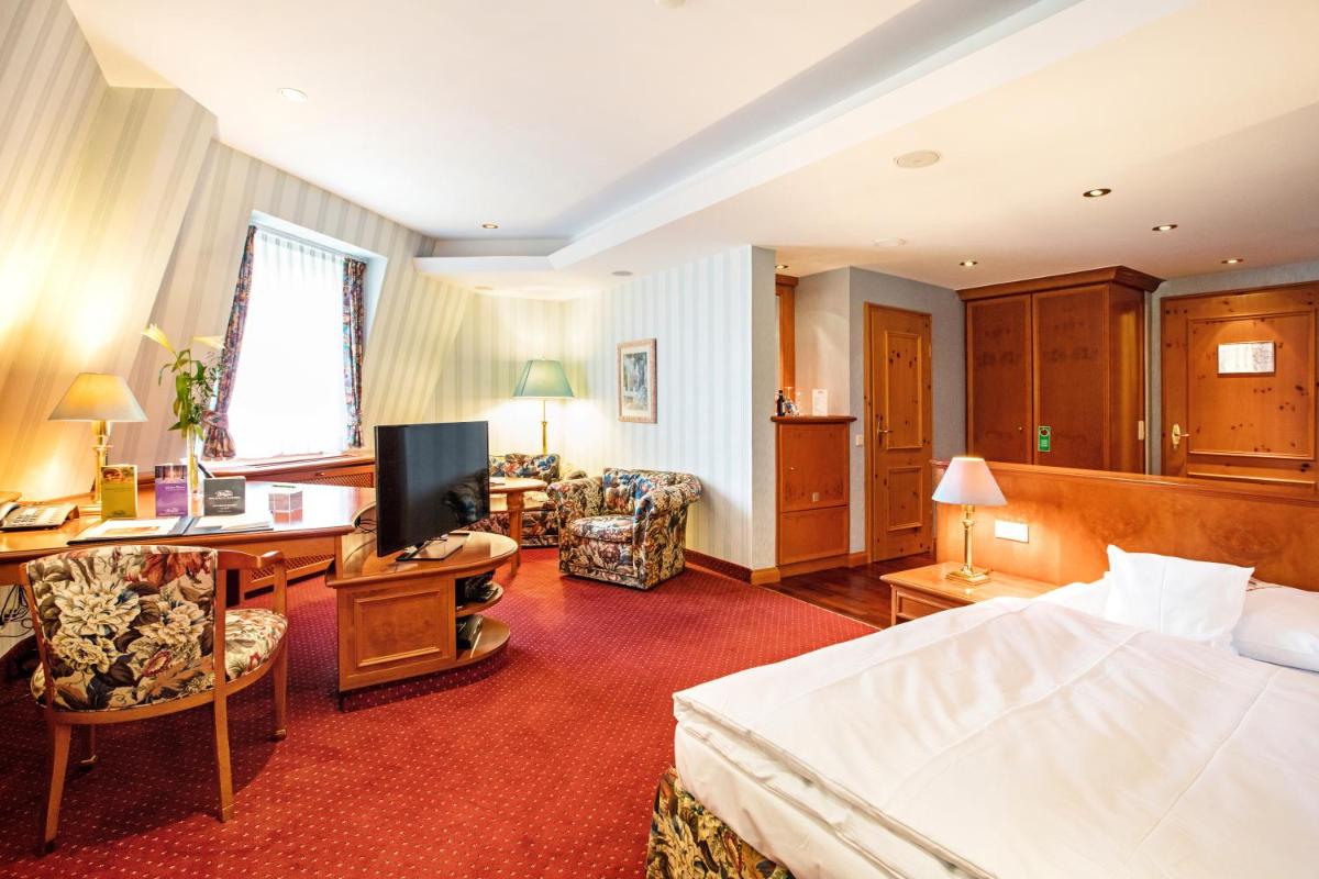 Ein Bett oder Betten in einem Zimmer der Unterkunft Waldhaus Reinbek