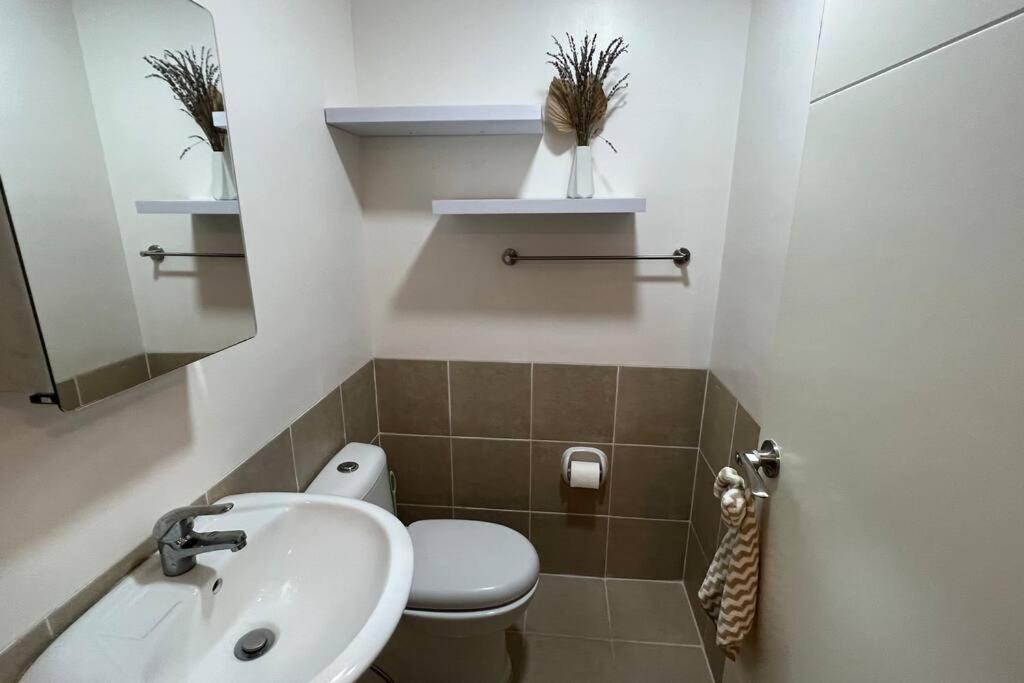 1-BR Condo Unit at The Celandine with Refreshing Balcony-view of the Pool - Housity