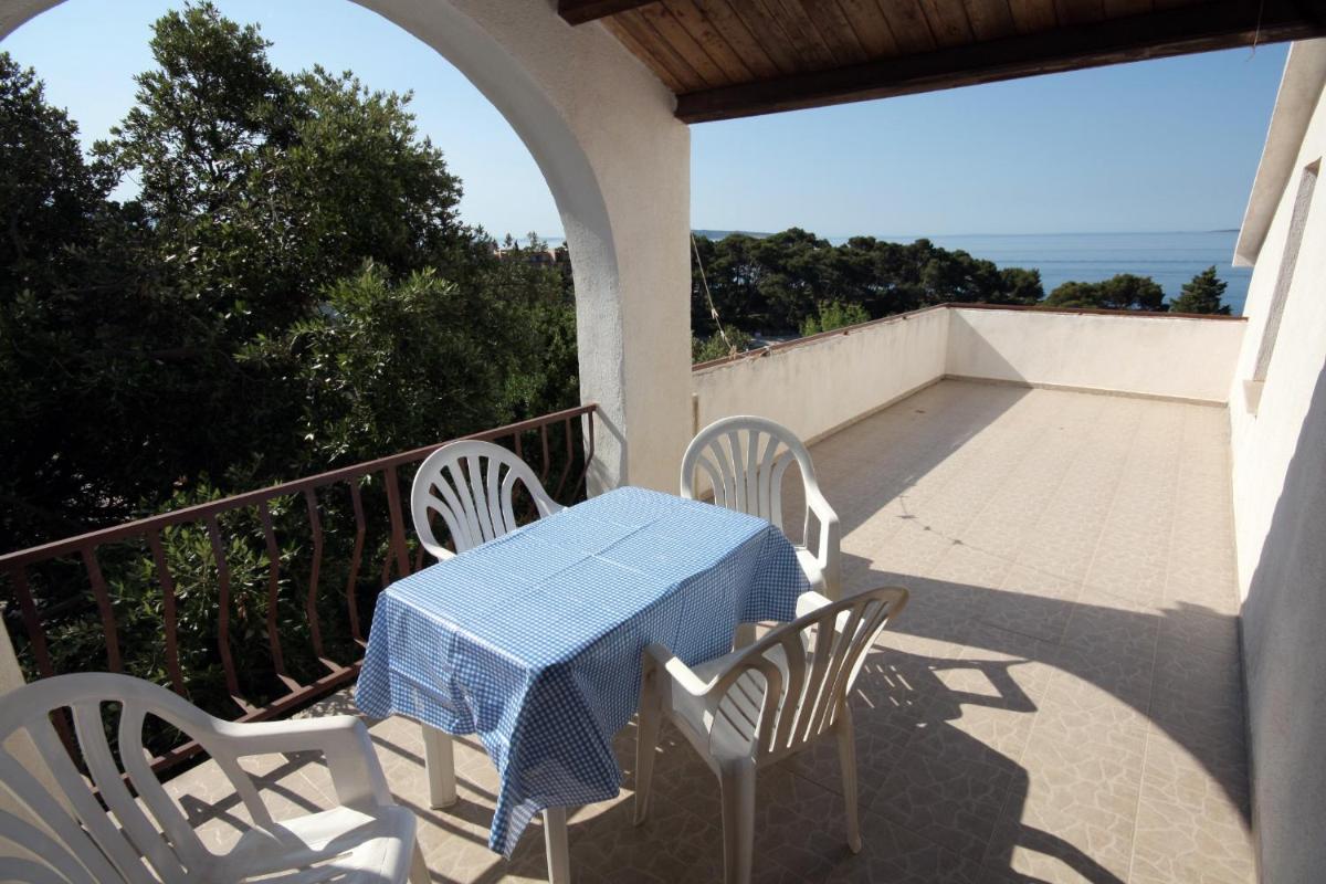 Apartments by the sea Suha Punta, Rab - 5050 - Housity