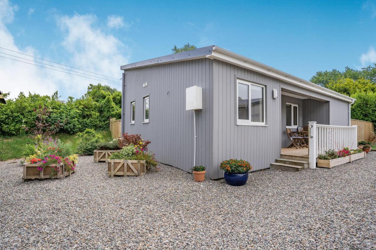 Caldey Lodge Bier Wood Lodges - Housity