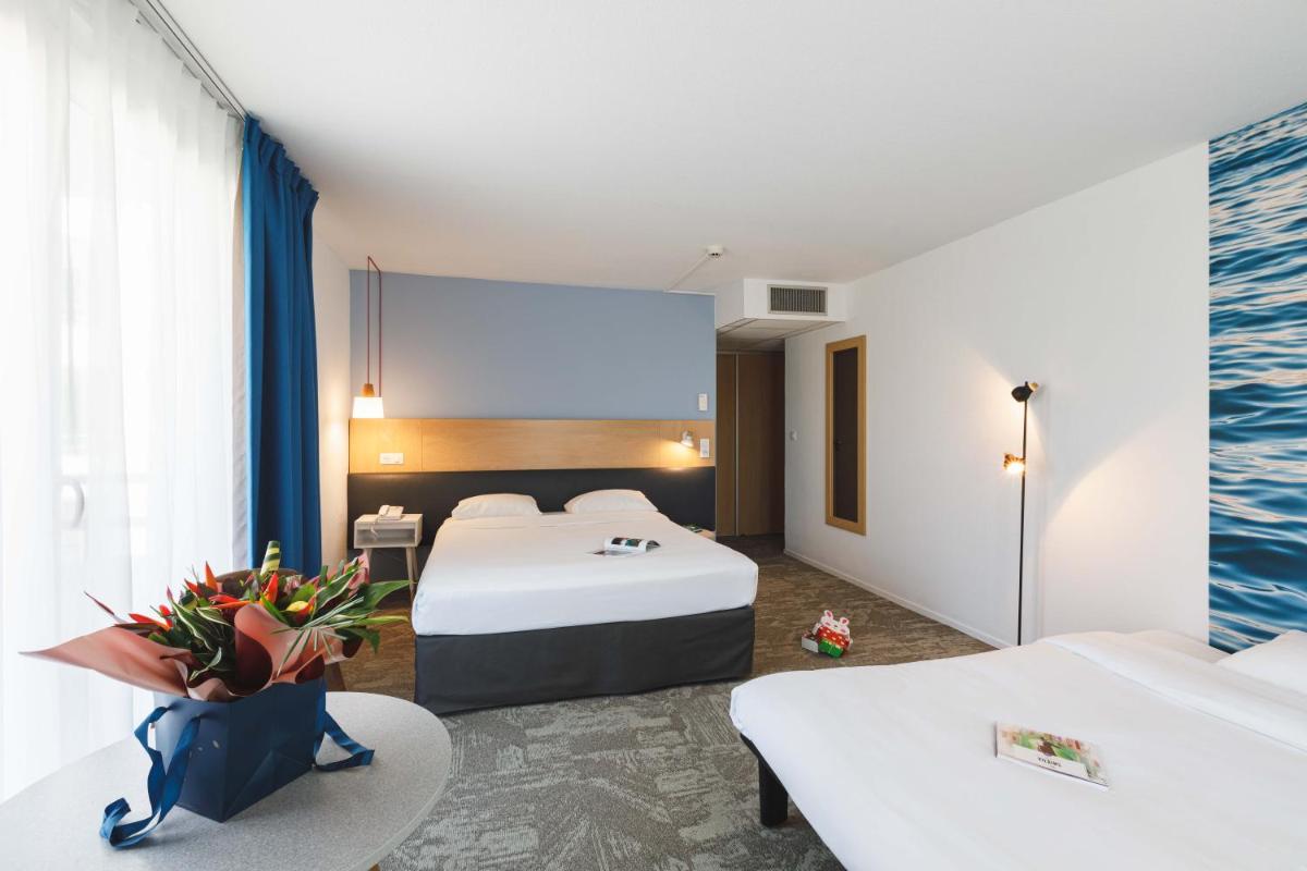 Un ou plusieurs lits dans un hébergement de l'établissement ibis Styles Aix les Bains Domaine de Marlioz