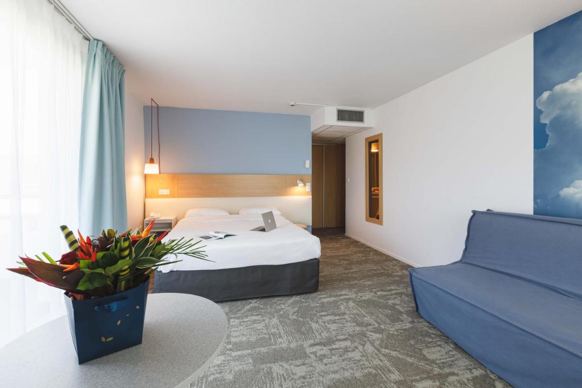 Un ou plusieurs lits dans un hébergement de l'établissement ibis Styles Aix les Bains Domaine de Marlioz