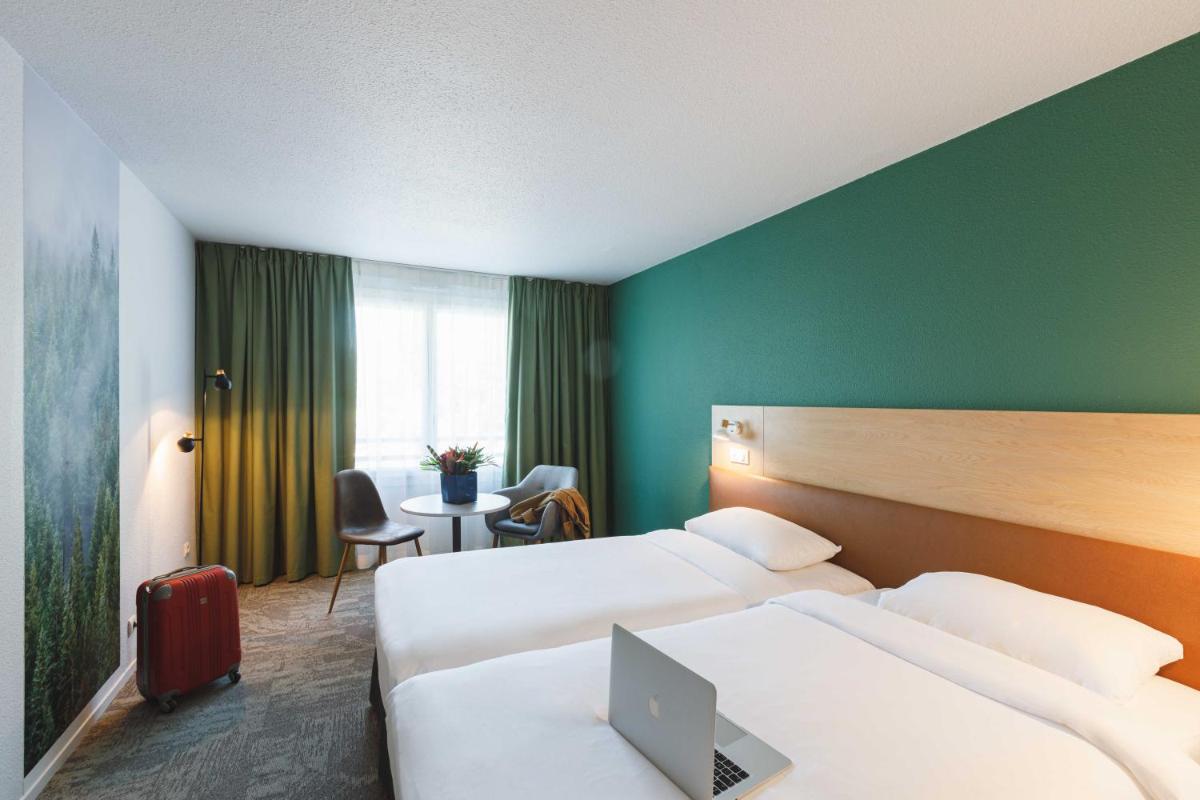 Un ou plusieurs lits dans un hébergement de l'établissement ibis Styles Aix les Bains Domaine de Marlioz