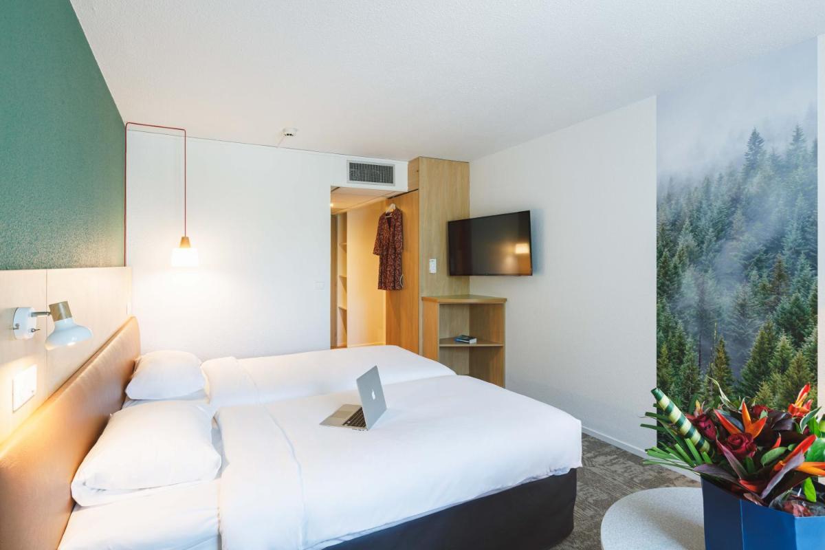 Un ou plusieurs lits dans un hébergement de l'établissement ibis Styles Aix les Bains Domaine de Marlioz