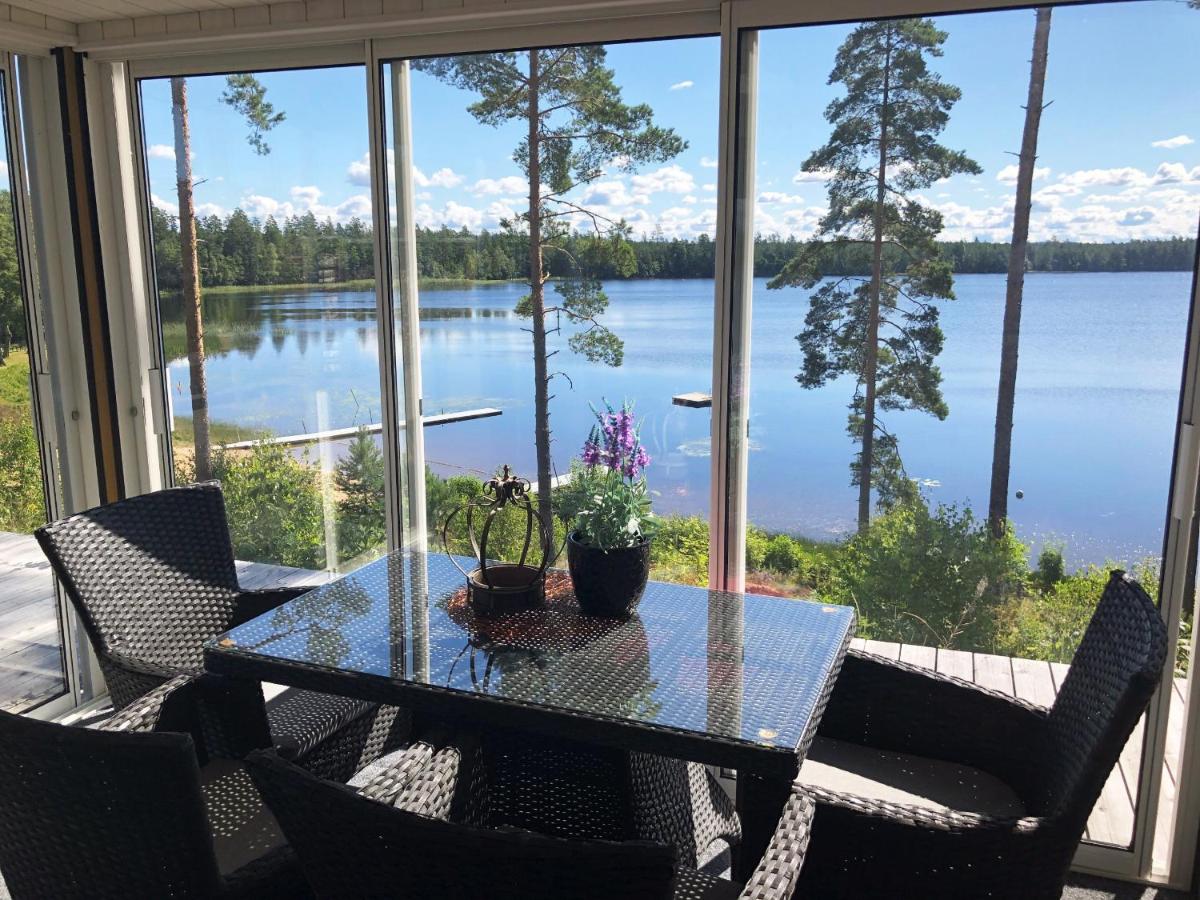 Fantastic house in Vaggeryd with a panoramic location by the lake Fangen - Housity