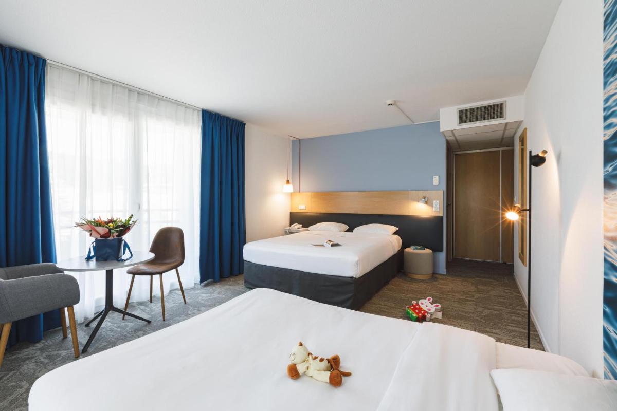 Un ou plusieurs lits dans un hébergement de l'établissement ibis Styles Aix les Bains Domaine de Marlioz