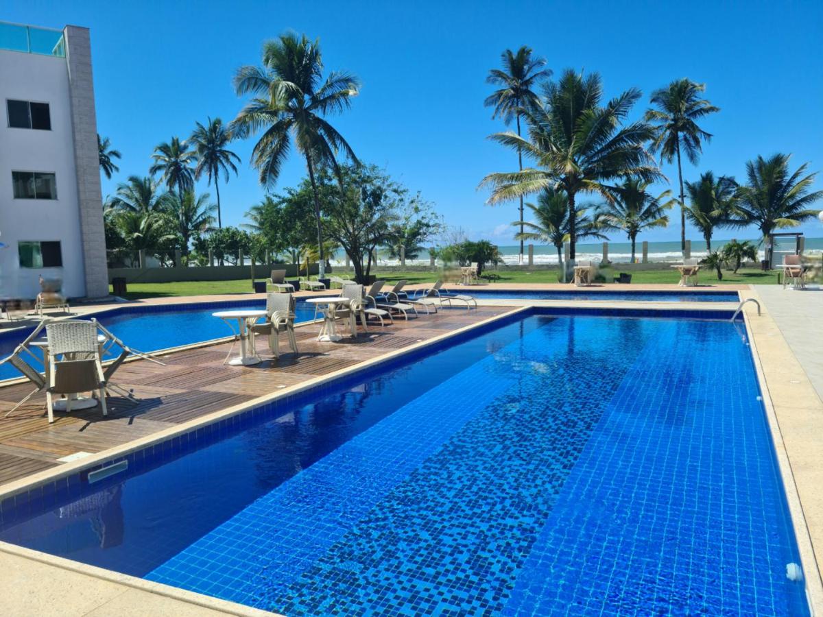 APARTAMENTO À BEIRA MAR - PÉ NA AREIA - Ilhéus - Housity