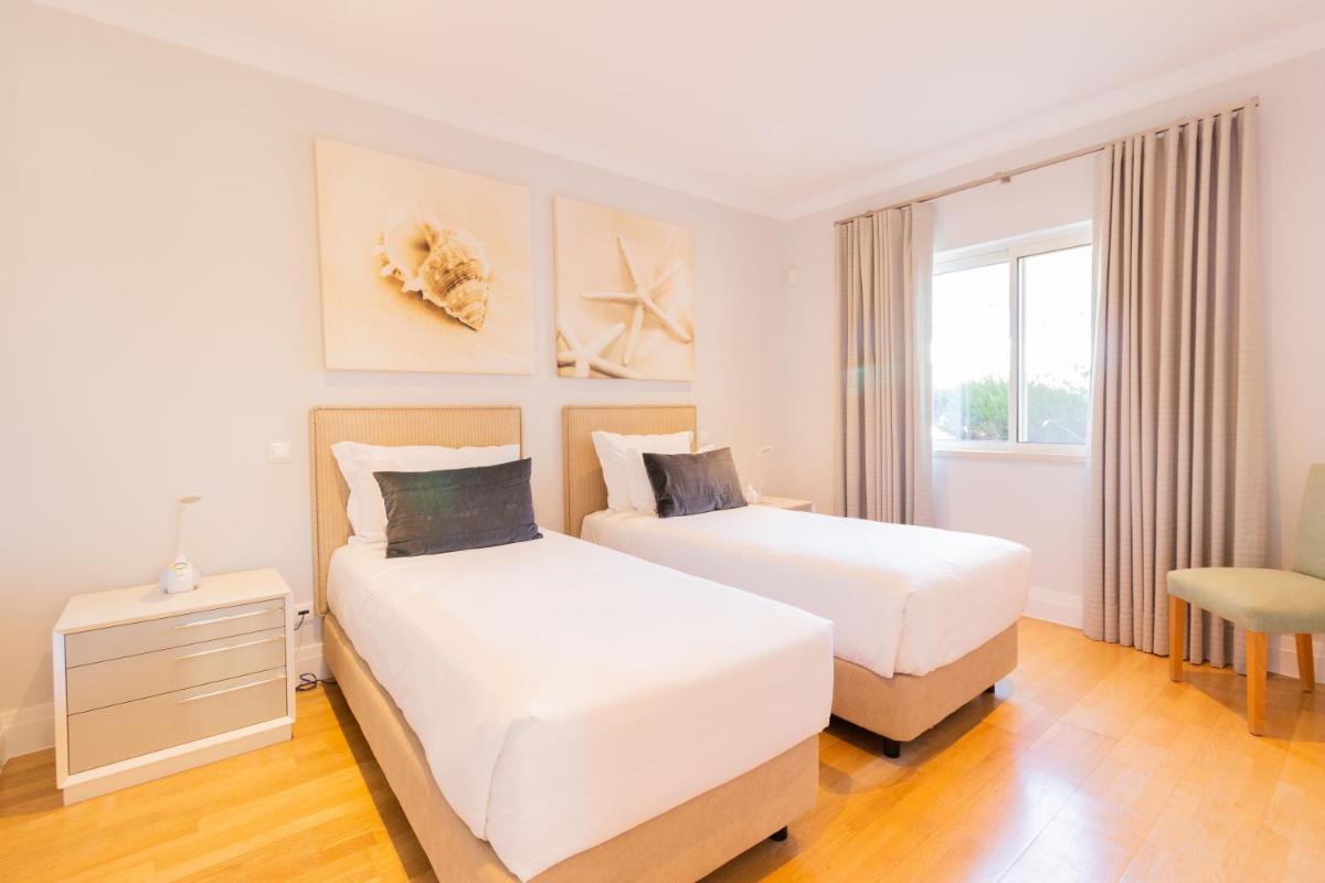 Uma cama ou camas num quarto em Dunas Douradas Beach Club