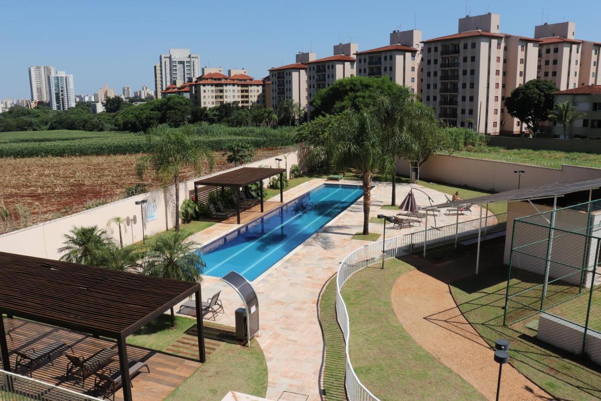 Flat com Wifi, Piscina, Split e Estacionamento - Housity