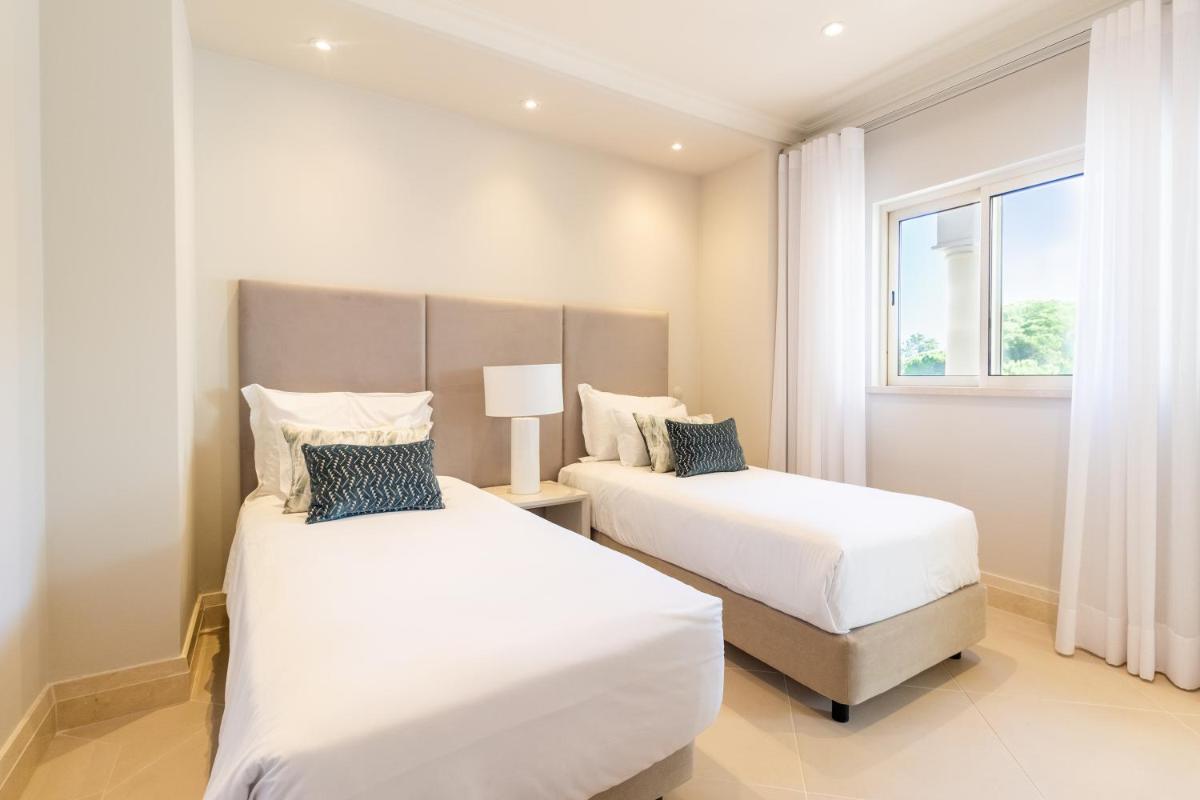 Uma cama ou camas num quarto em Dunas Douradas Beach Club