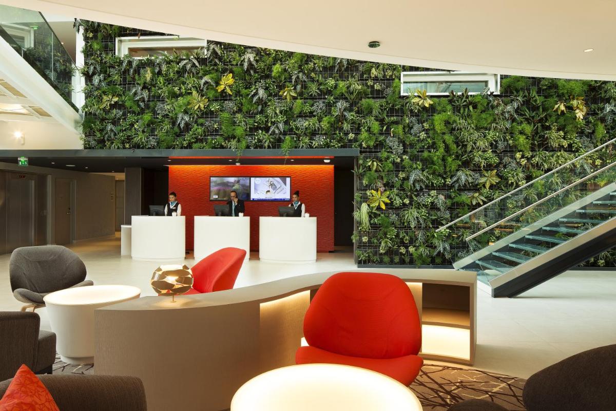 Coin salon dans l'établissement Oceania Paris Roissy CDG