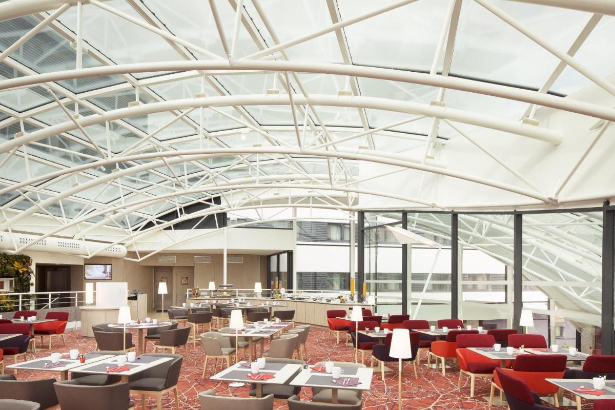 Restaurant ou autre lieu de restauration dans l'établissement Oceania Paris Roissy CDG