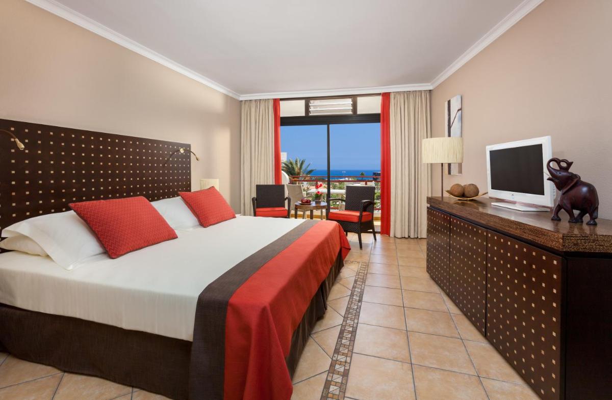 Cama o camas de una habitación en Seaside Sandy Beach