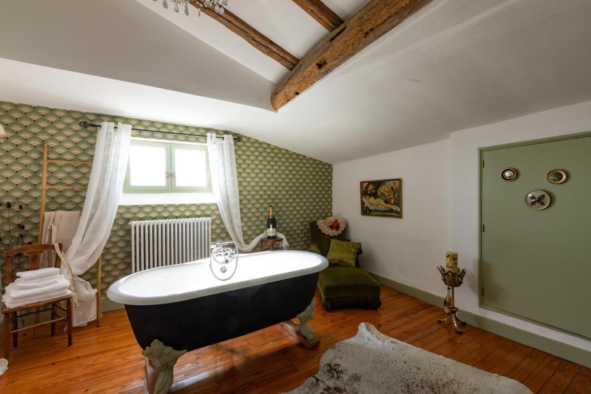 Luxueuses Suites & Chambres d'hôtes - accueil champagne, petit-déjeuner - Maison Champagne - Housity