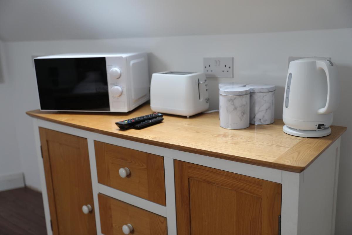 Cosy Loft situated on shores of Lough Neagh - Housity
