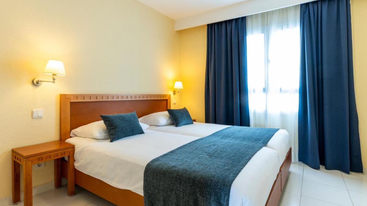 Cama o camas de una habitación en Hapimag Apartments Marbella
