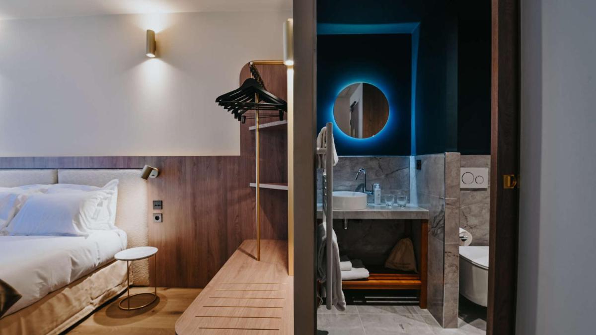Un ou plusieurs lits dans un hébergement de l'établissement Keystone Hôtel & Spa