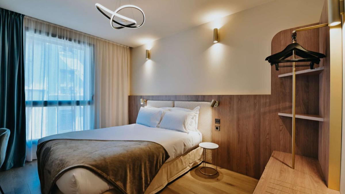 Un ou plusieurs lits dans un hébergement de l'établissement Keystone Hôtel & Spa