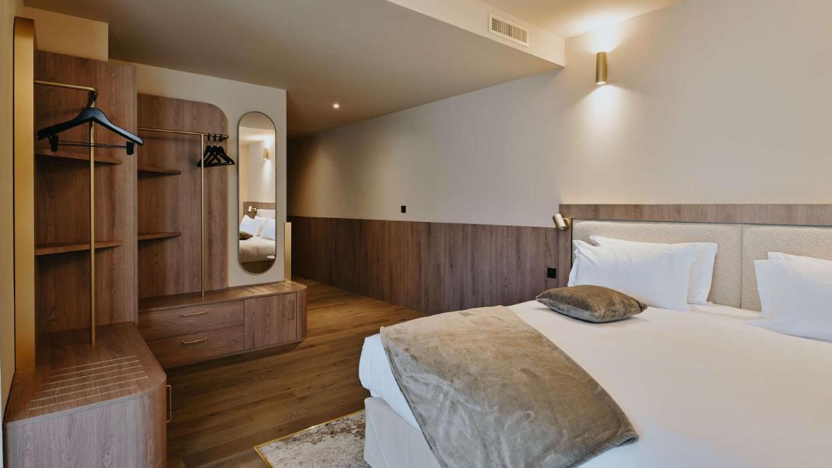 Un ou plusieurs lits dans un hébergement de l'établissement Keystone Hôtel & Spa
