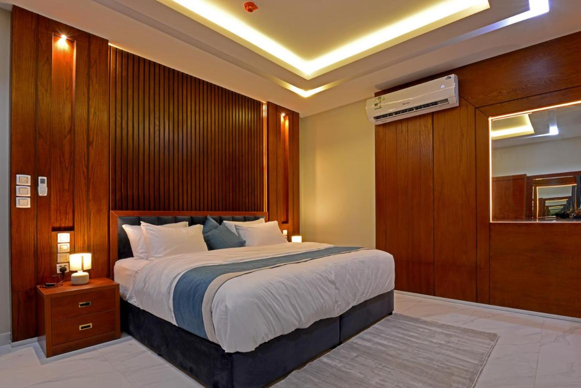 شقق اجنحة كنزان للشقق المخدومة Knzan Suites - Housity