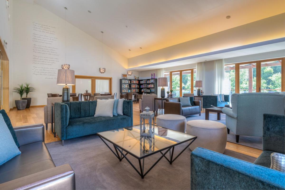 Uma área de estar em Hotel Rural Vale Do Rio