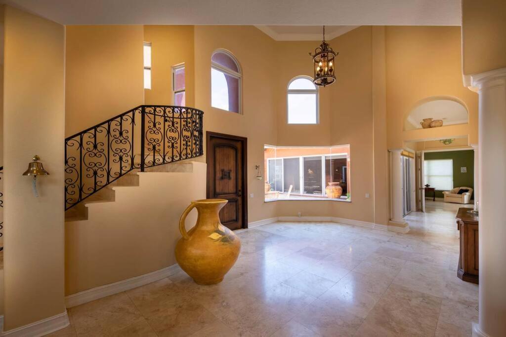 Casa Del Sol - Mediterranean Style Waterfront Pool Home - Housity