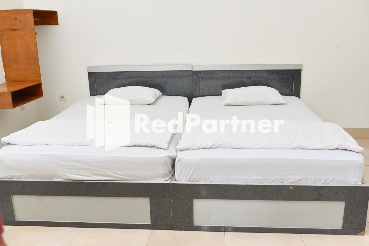 Homestay Rumah Citra Indah Syariah Mitra RedDoorz - Housity