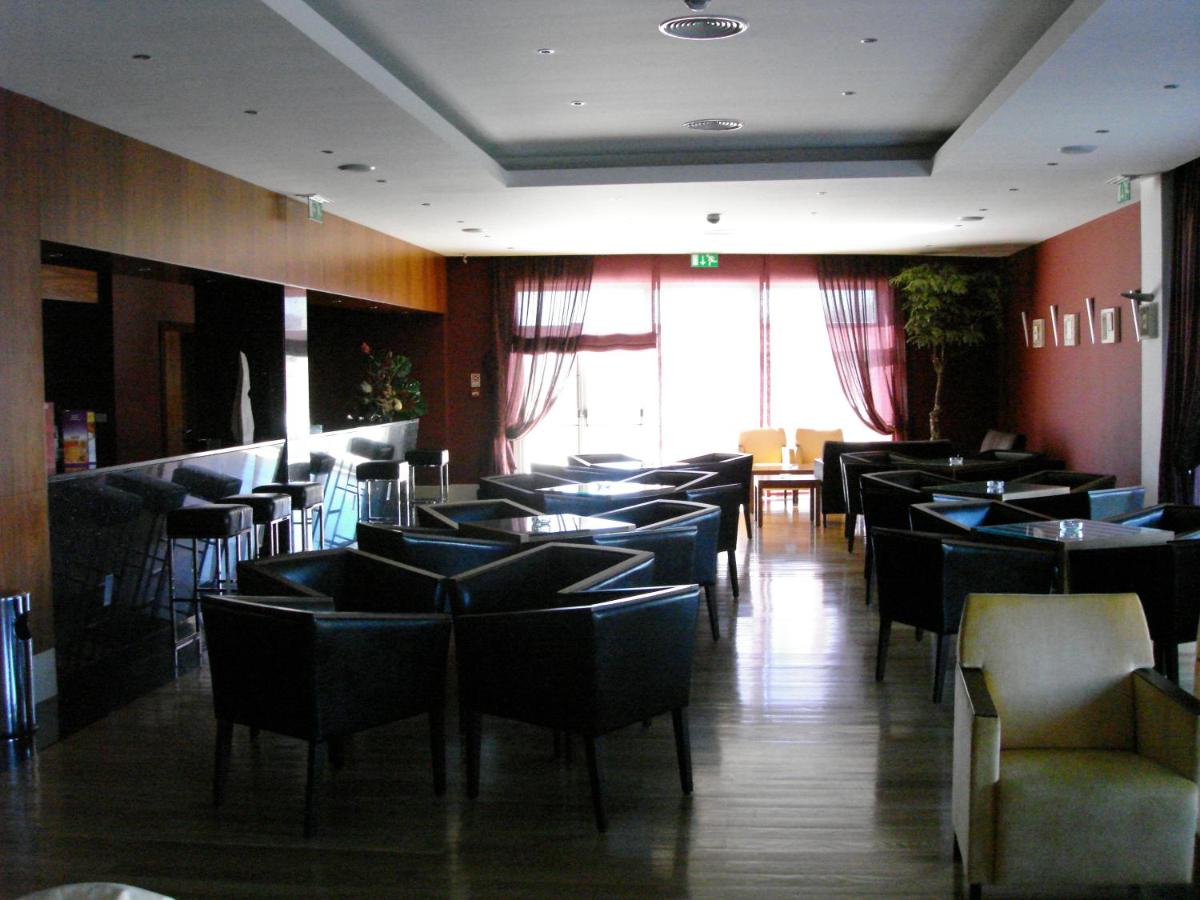 Uma área de estar em Hotel Lusitania Congress & Spa