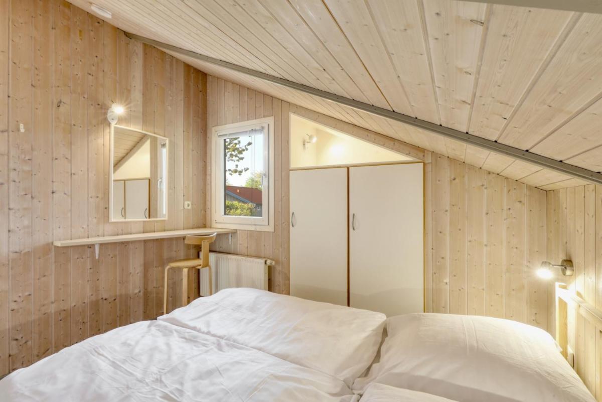 Kranich Ferienhäuser mit Innenpool - Housity