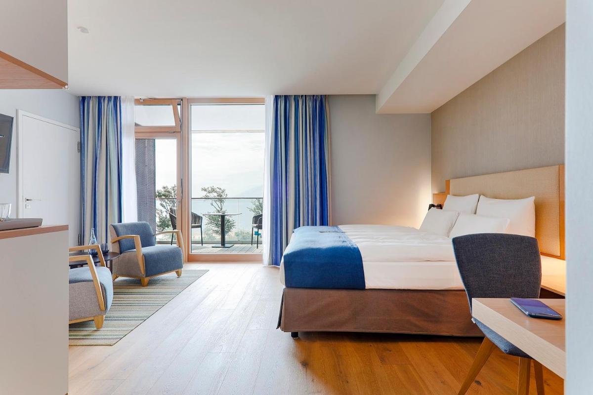 Ein Bett oder Betten in einem Zimmer der Unterkunft Upstalsboom Wyk auf Föhr
