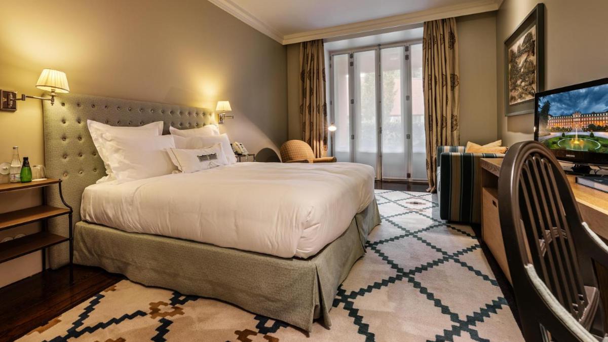 Uma cama ou camas num quarto em Vidago Palace