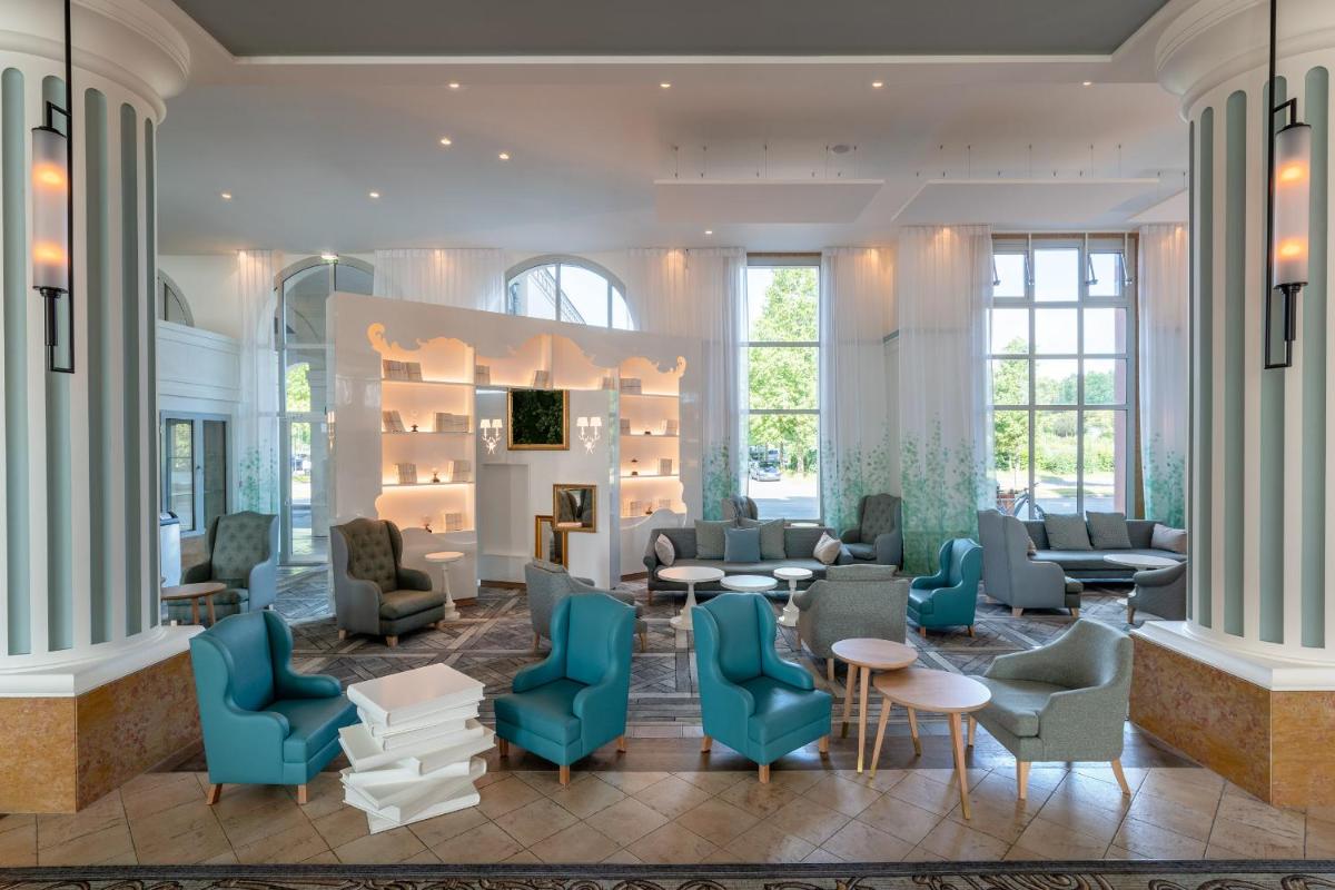 Coin salon dans l'établissement Dream Castle Hotel Marne La Vallee