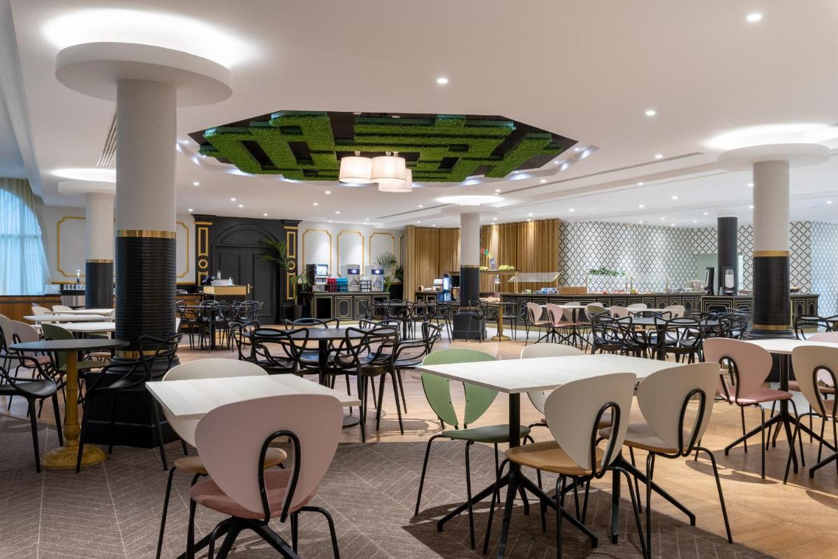 Restaurant ou autre lieu de restauration dans l'établissement Dream Castle Hotel Marne La Vallee