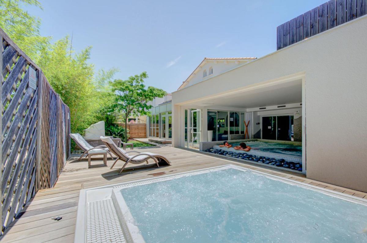 Piscine de l'établissement Le Cottage - Hotel & Spa ou située à proximité