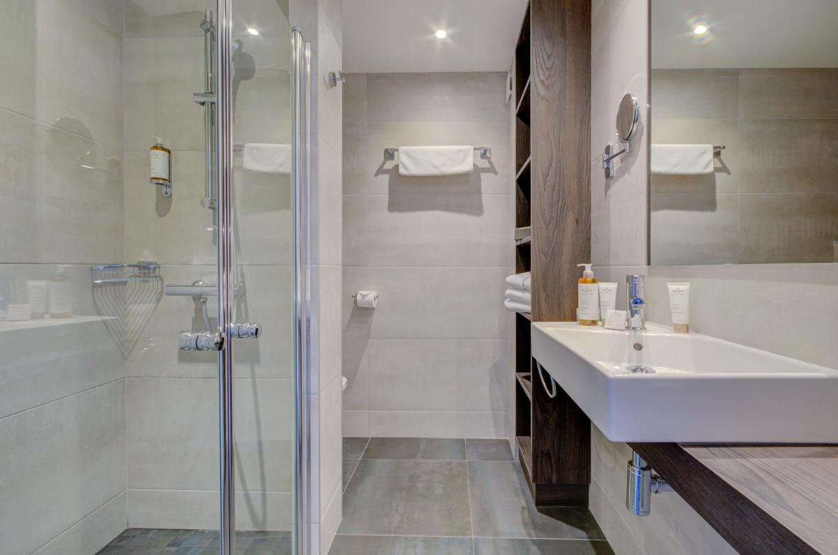 Salle de bains dans l'établissement Le Cottage - Hotel & Spa